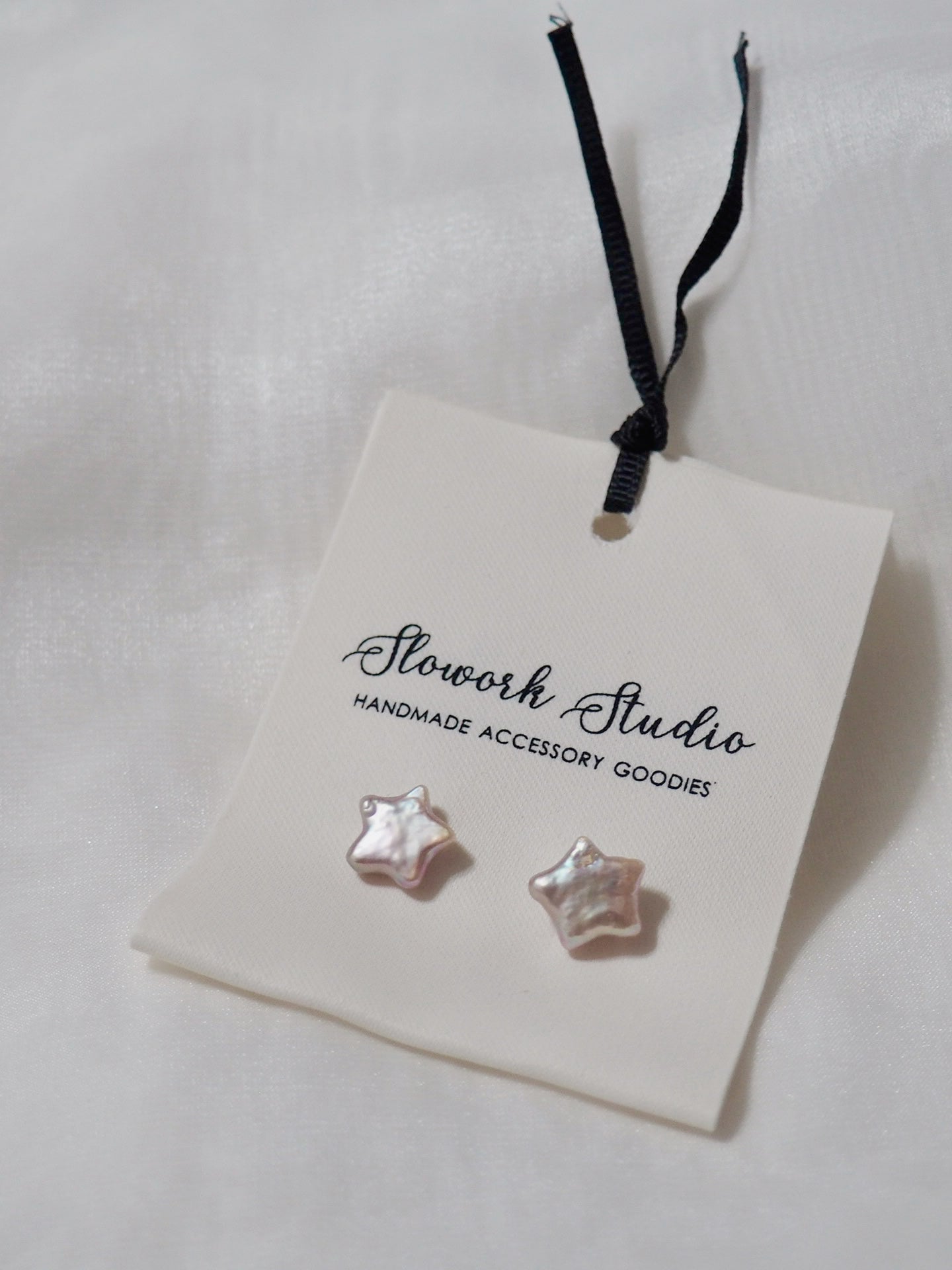 天然星星巴洛克珍珠耳環(白/紫色)