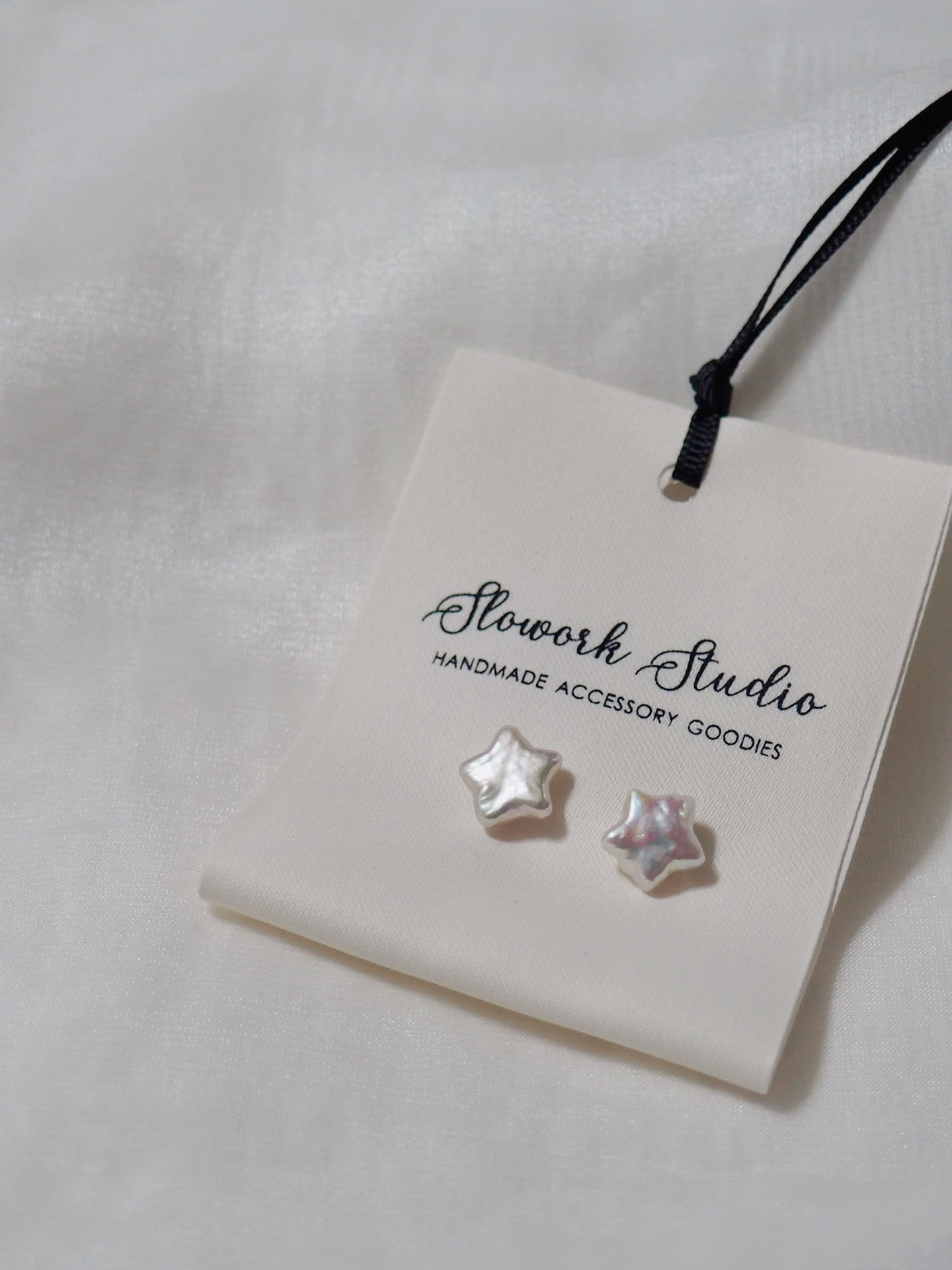 天然星星巴洛克珍珠耳環(白/紫色)