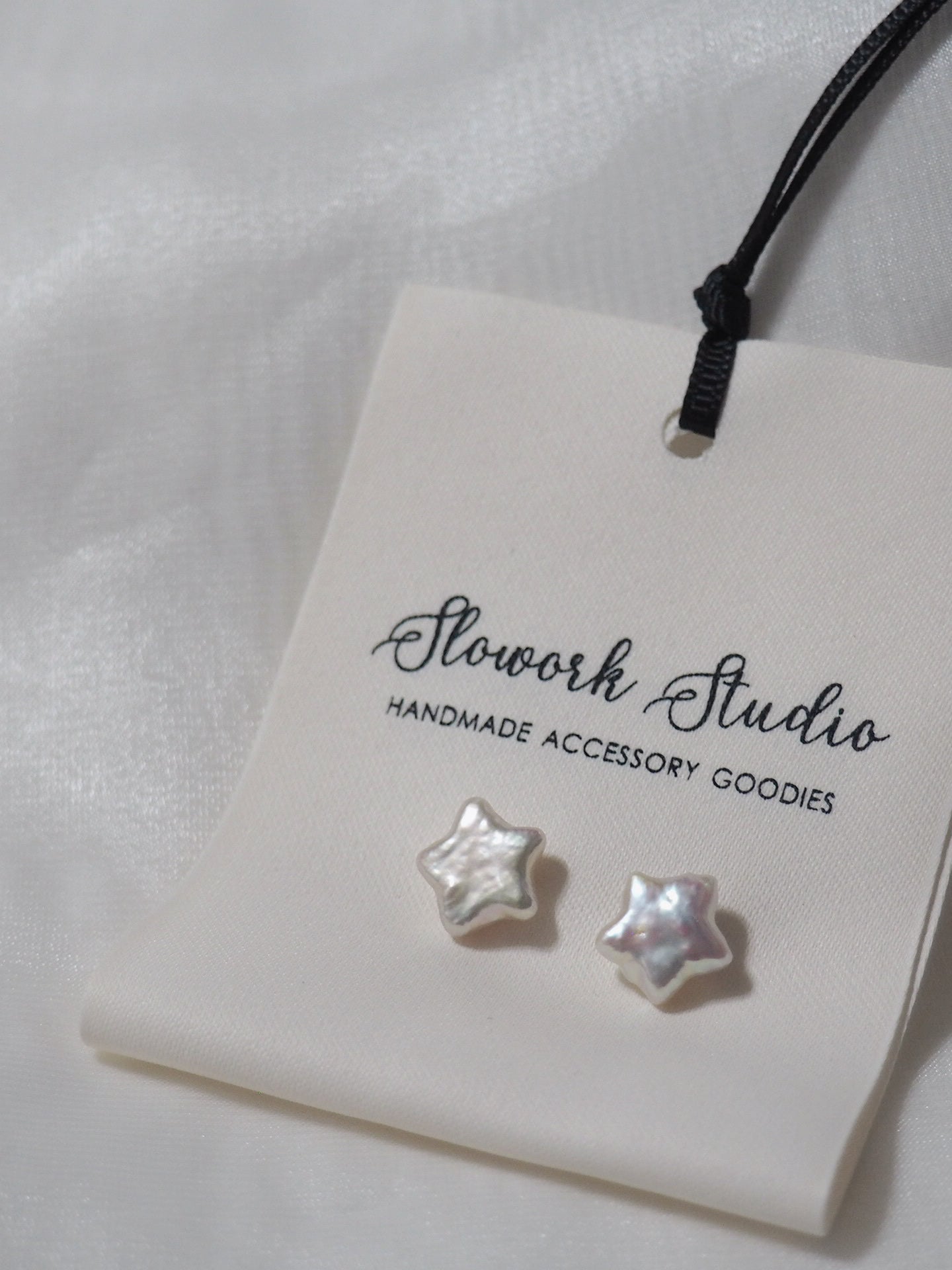 天然星星巴洛克珍珠耳環(白/紫色)